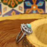 Women’s Nishaburi silver turquoise ring with Hanana design
