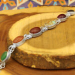Women’s silver bracelet with many stones, handmade by Romina design