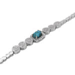 Women’s silver Nishaburi turquoise bracelet with gold design
