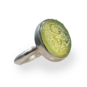 Light Green Agate engraved with "یا مهدی". Metal: 925 Sterling Silver. Weight: 6 grams (exceptionally delicate). Stone Size: 13mm (petite and graceful). Design Style: Delicate ("ظریف"), feminine, and serene. Engraving: Precise, elegant micro-calligraphy.