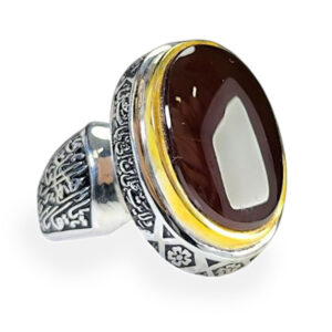 Engraving text: Wilayat Ali ibn Abi Talib (ع) – Hand‑engraved Stone: Red Yemeni agate, domed (22 mm) Metal: 925 Sterling Silver (Handmade) Side Engravings: یا قاهر العدو یا والی الولی یا مظهر العجائب و یا مرتضی علی Hidden Feature: Imam Jawad (ع) Talisman + Karbala soil Weight: Approx. 27 g Customization: Engraving & stone color available